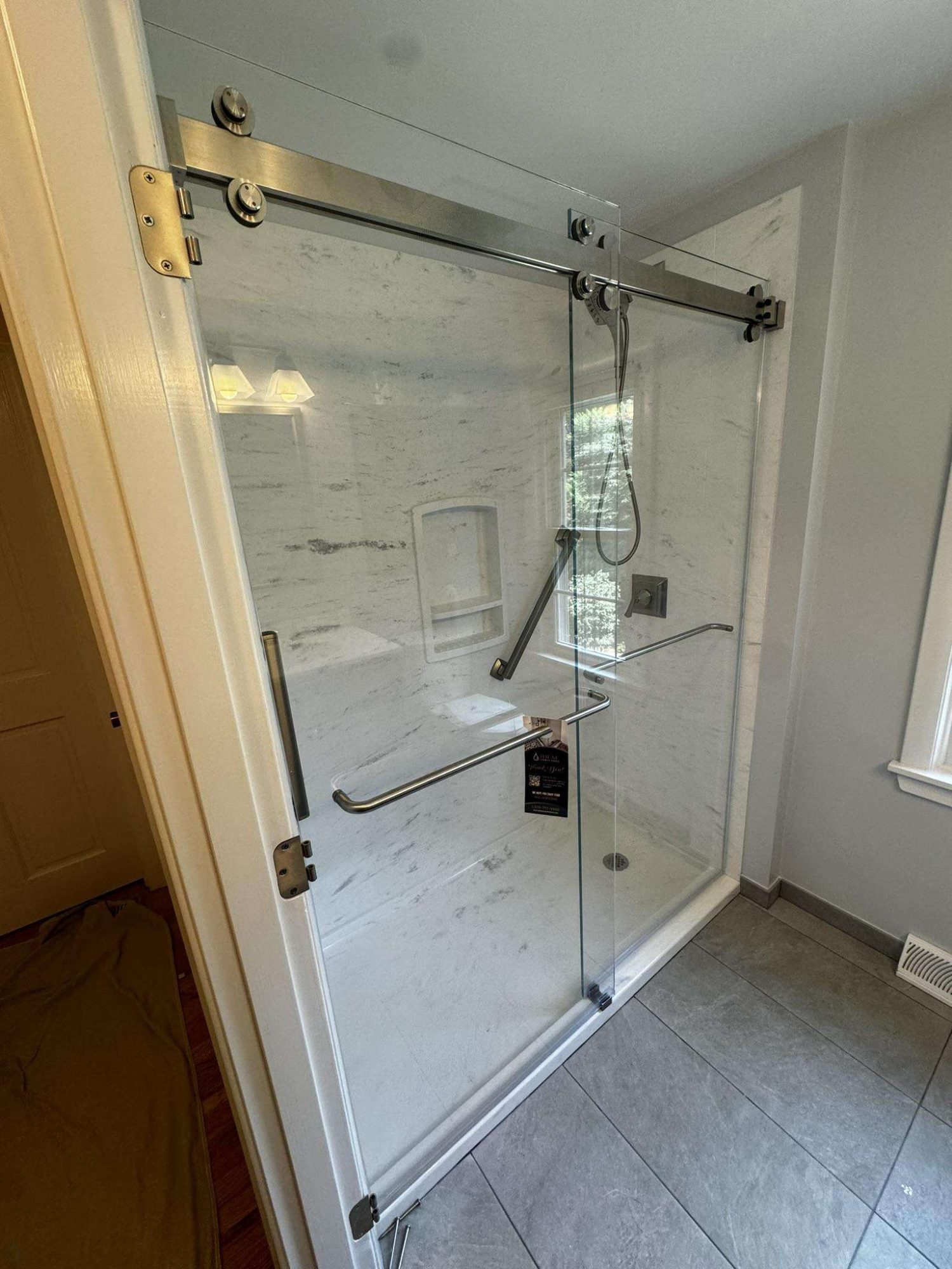 Ideal Shower Doors Logo